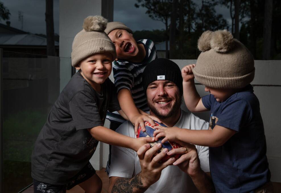 Beanies: Newcastle Knight David Klemmer and his three boys, Cooper, Jaxon and DJ, supporting the Mark Hughes Foundation. Picture: Marina Neil 