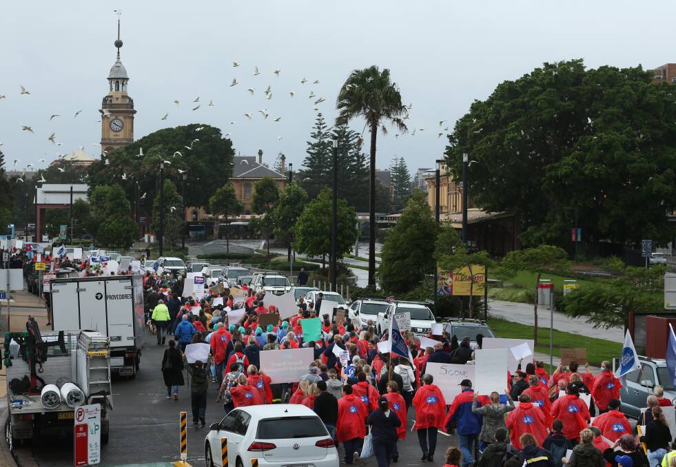 Strike: More than 1000 nurses and midwives from the Hunter marched through Newcastle as part of 24-hour strike action on March 31. Picture: Simone De Peak