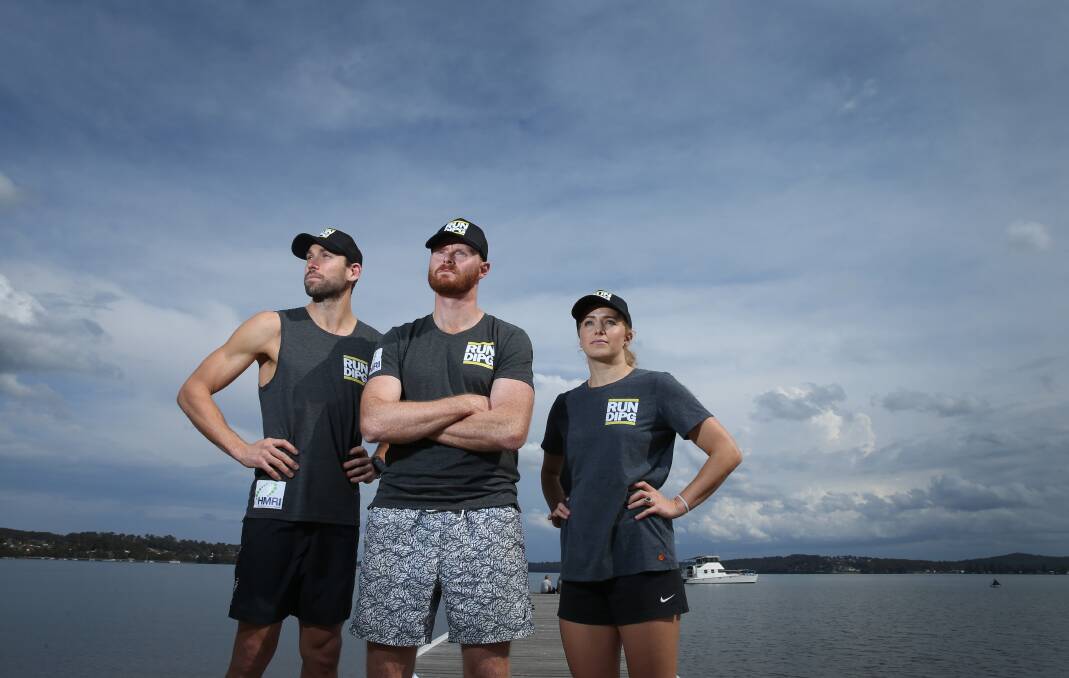 Hope: Cancer researcher Dr Matt Dun, centre, with his RUN DIPG team mates Lucas McBeath and Tabitha McLachlan. They are running to bring the world's attention to the deadly brain stem cancer, DIPG. Picture: Marina Neil

