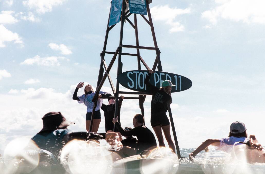 Paddle out protest against gas drilling. Picture:Zoe Strapp