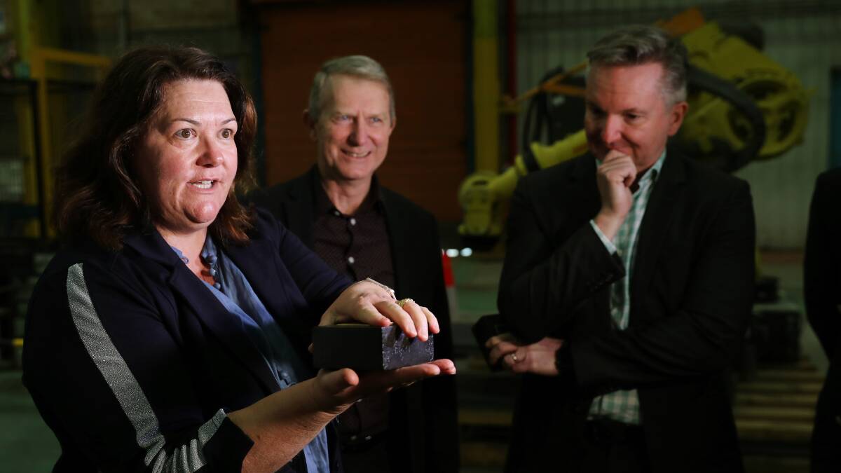 Paterson MP Meryl Swanson explains MGA Thermal brick technology as company ceo Erich Kisi and Energy Minister Chris Bowen look on. Picture: Peter Lorimer 