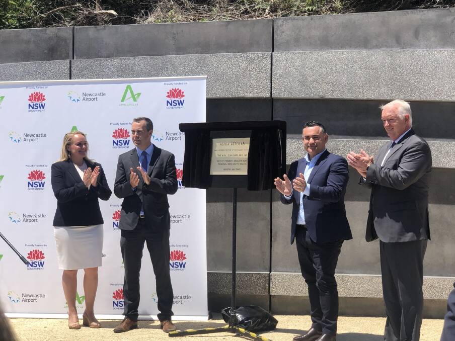 L-R: Newcastle Lord Mayor Nuatali Nelmes, Port Stephens mayor Ryan Palmer, Deputy Premier John Barilaro, and Newcastle Airport chairman Kirby Clark at the unveiling of stage one of Austa Aerolab, Williamtown on Tuesday. 