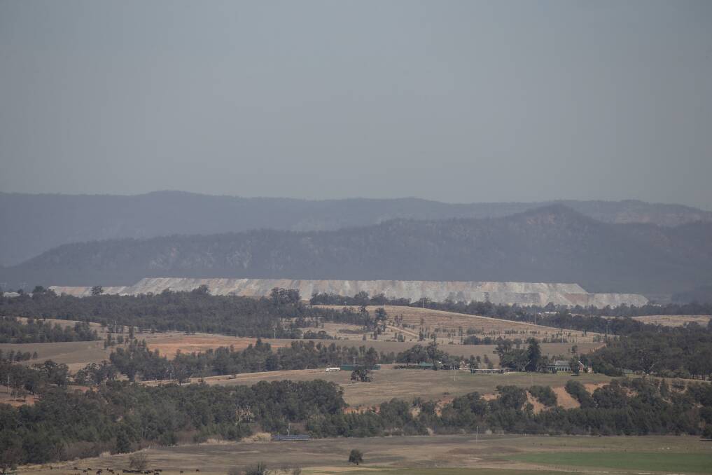 Haze: Hunter environment groups have criticised the NSW clean air draft strategy for failing to provide new solutions for improving the region's air quality. Picture: Marina Neil 