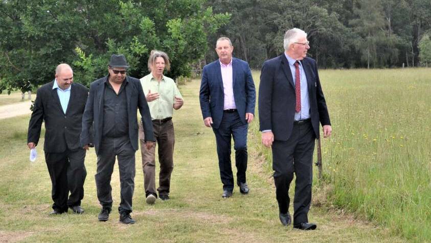 Wonnarua Nation Aboriginal Corporation chair Lee Hinton and CEO Laurie Perry, Jerry Schwartz, former Upper Hunter MP Michael Johnsen and former Cessnock mayor Bob Pynsent at the site of the proposed cultural centre at Lovedale in 2020.