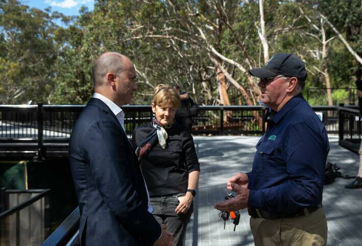 Looking for answers: Port Stephens Koalas secretary Ron Land speaks with environment minister Matt Kean. Picture: Marina Neil. 