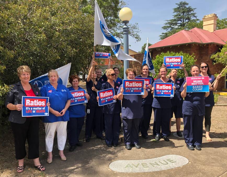 Seeking balance: Nurses and midwives outside Singleton hospital at lunchtime on Wednesday rallied for improved staff to patient ratios. Picture: Matthew Kelly