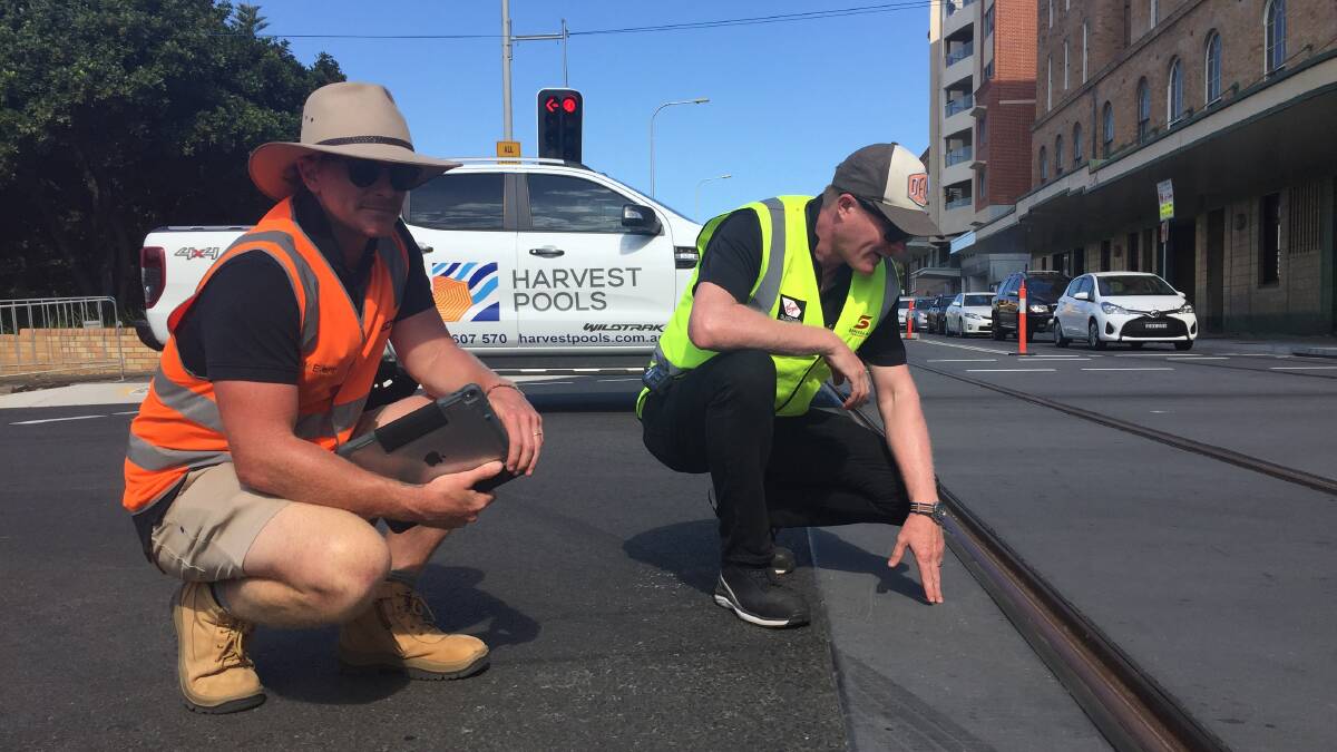 Supercars' organisers inspect the Watt Street intersection on Wednesday afternoon. 