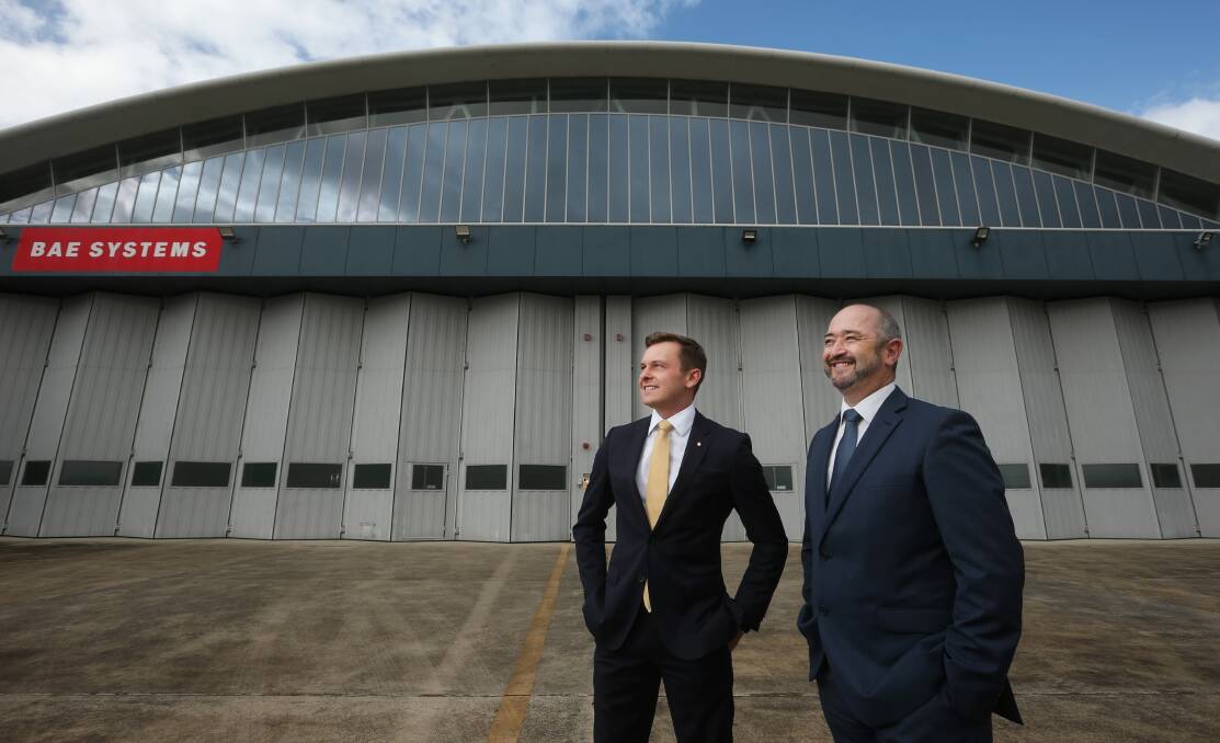 Taylor Martin Parliamentary Secretary for the Hunter, Andrew Gresham Managing Director - Defence Delivery at BAE System outside a hangar at BAE Systems Australia in Williamtown. Picture: Simone DePeak