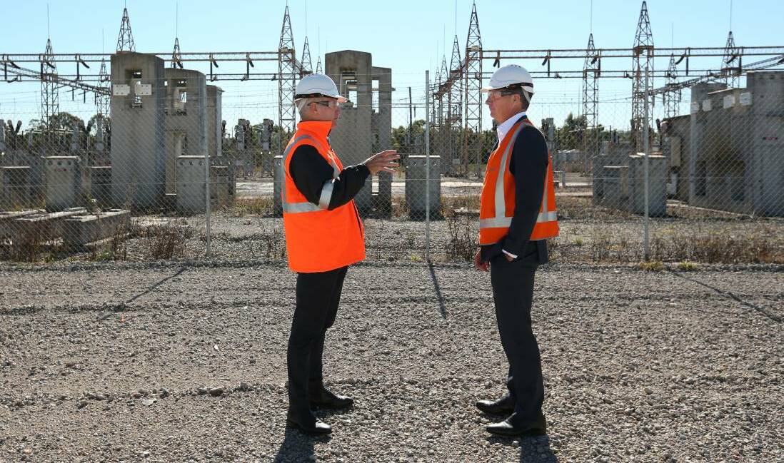 Snowy Hydro chief executive and managing director Paul Broad at the former Kurri Kurri smelter site proposed for a gas-fired power station, with Energy Minister Angus Taylor in May this year.