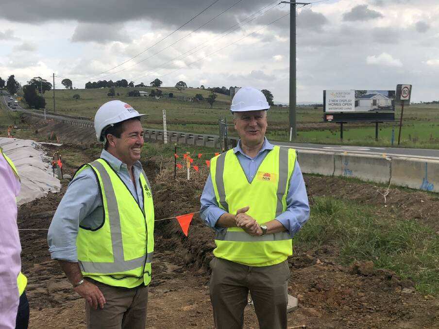 On the road: NSW Minister for Regional Transport and Roads Paul Toole with Deputy Prime Minister Michael McCormack at Testers Hollow on Tuesday. 