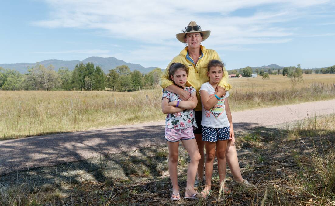 Rebecca Clark pictured with her daughters Lola, 6, and Hattie, 8. The Hunter Gas Pipeline would make about 15 per cent of their land unusable for farming. Picture by Max Mason-Hubers