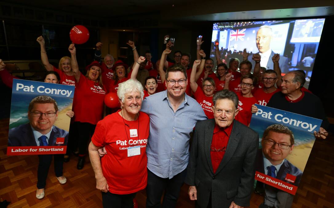 Team Shortland: Re-elected Shortland MP Pat Conroy with former MPs Jill Hall (left) and Peter Morris (right). The party had a 5.3 per cent swing away from it on Saturday. Picture: Jonathan Carroll.