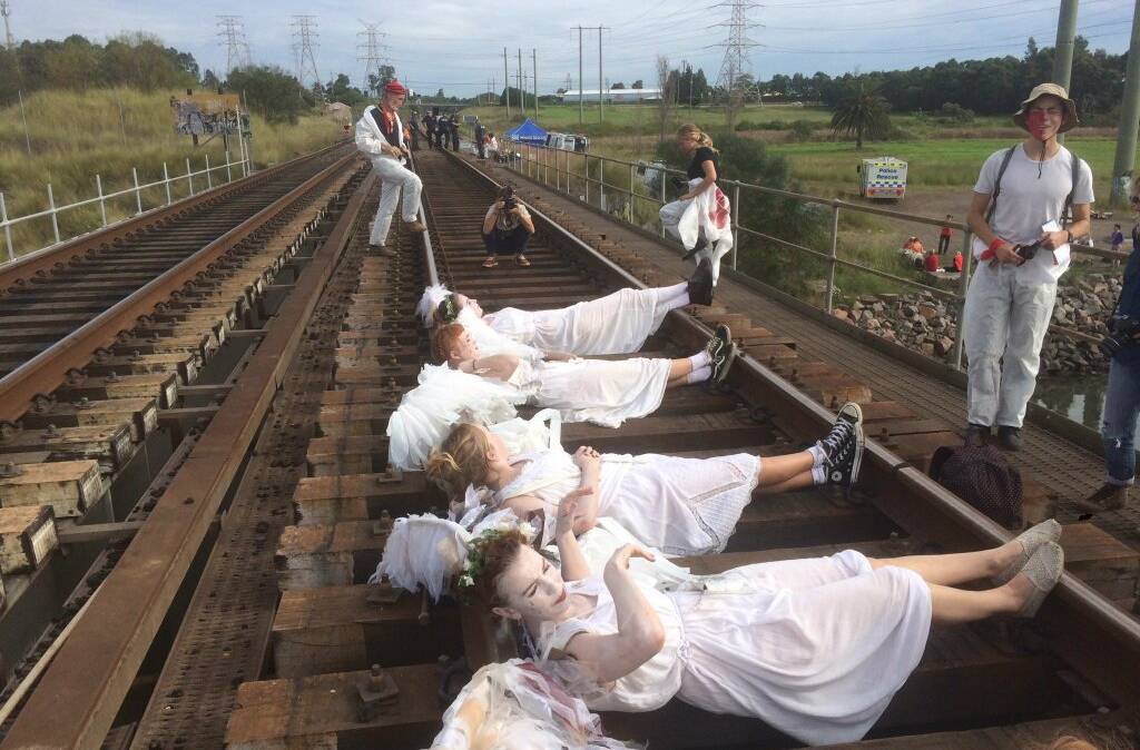 Climate protesters block the Kooragang rail line as part of the 2016 Newcastle harbour blockade. 