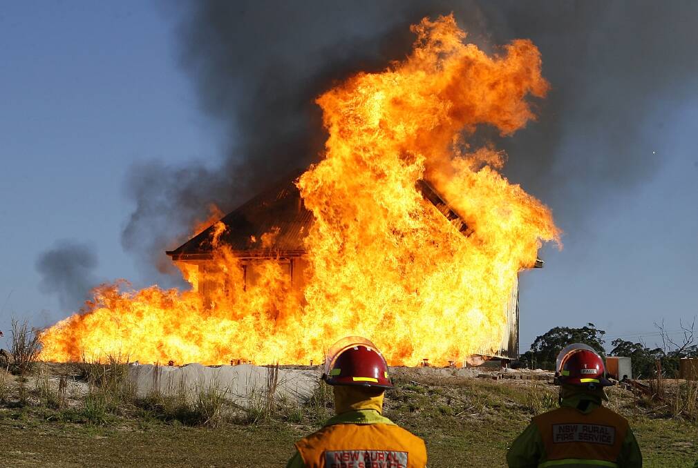 Fireproof: The CSIRO tests a 'bushfire-proof' house design at the RFS Eurobodalla training facility in 2010. Picture: Stefan Postles