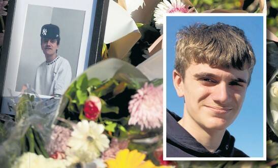 Some of the tributes laid at a memorial to Bryson Dimovski at Warners Bay. 