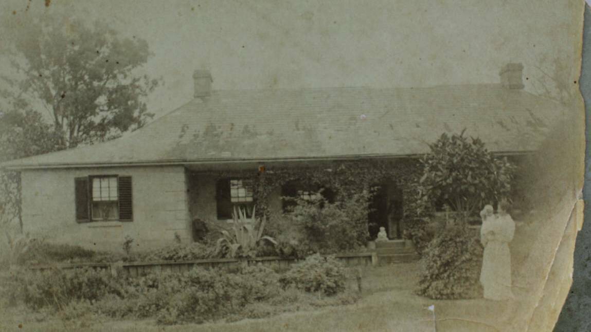 Ravensworth Homestead circa 1894. Photo shows one time owner Mrs Hill holding a baby.
