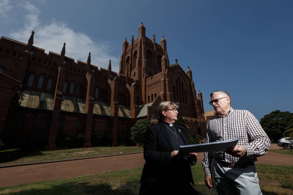 Iconic structure: Barney Collins and Anglican Dean of Newcastle Katherine Bowyer. Picture: Max Mason Hubers.