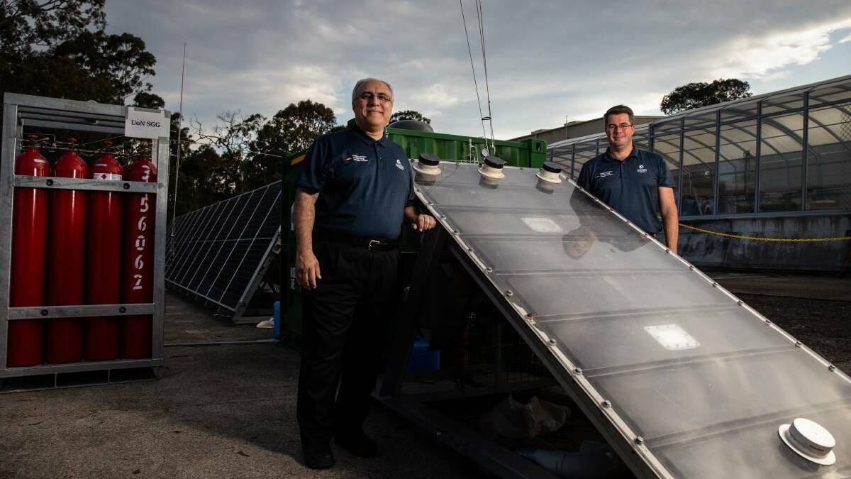 Professor Behdad Moghtaderi with Dr Andrew Maddocks and the solar Hydro Harvester.