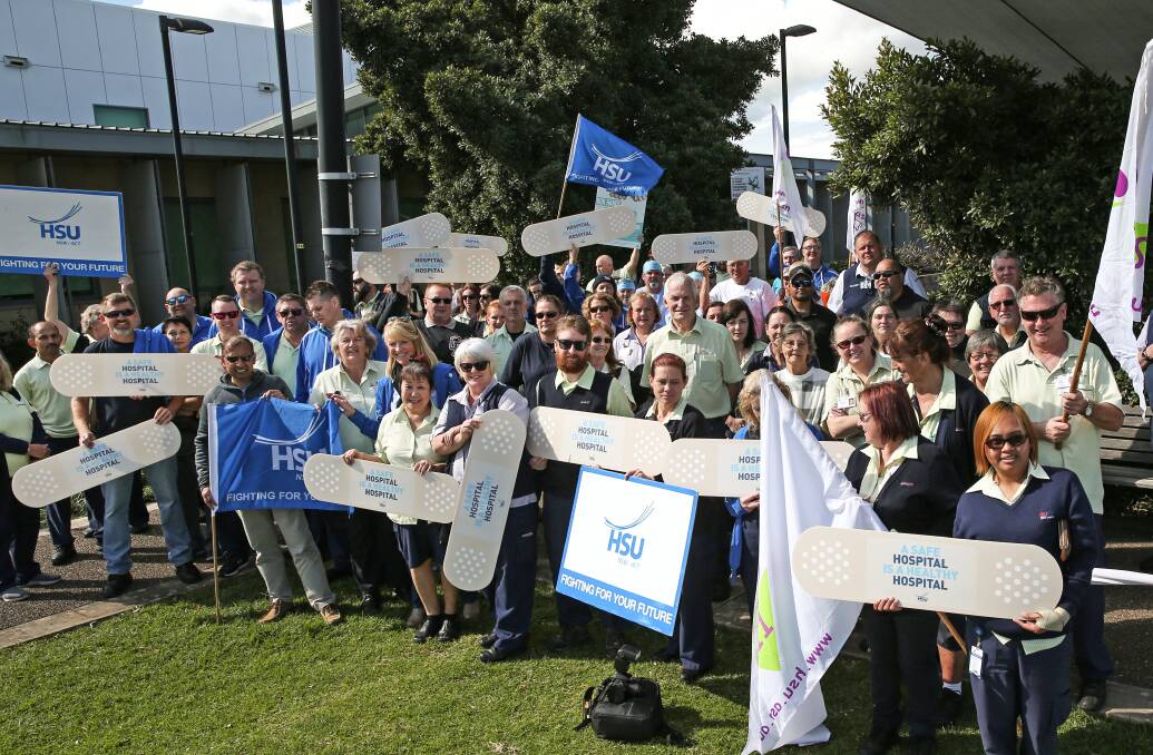 Front line: Health Services Union members strike at the John Hunter Hospital on Thursday morning. Picture: Marina Neil