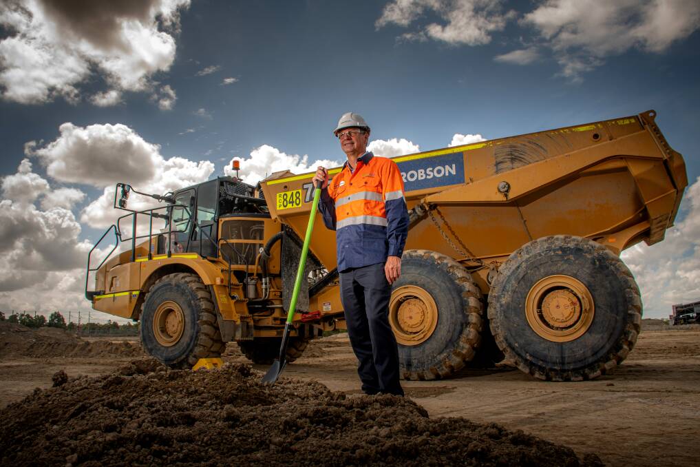 Digging in: Angus Taylor gets construction underway at the Hunter Power Project at Kurri this week. He argues reliable and affordable energy is essential for a successful transition. Picture: Simon McCarthy. 