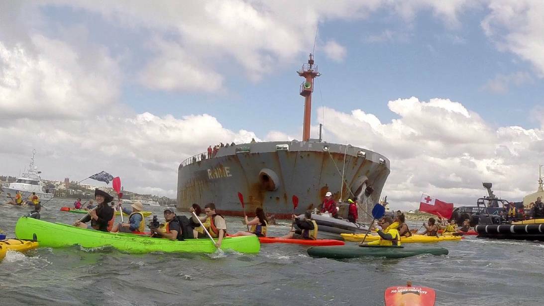  About 130 protesters defied an exclusion zone to prevent a ship from entering Newcastle Harbour during a protest in October 2014. Picture: Darren Pateman