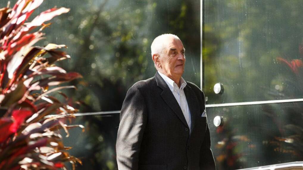  ACCUSED: The former Anglican Dean of Newcastle, Graeme Lawrence, arriving at Newcastle courthouse on Thursday before his sexual assault trial was delayed again. Picture: Max Mason-Hubers