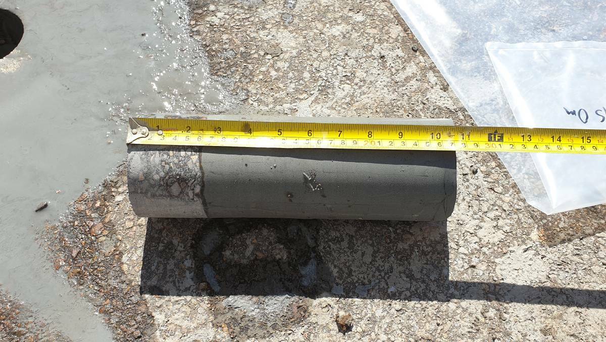 A core sample taken during performance testing of high fly ash content road base trial at Eraring. Picture: Origin Energy.