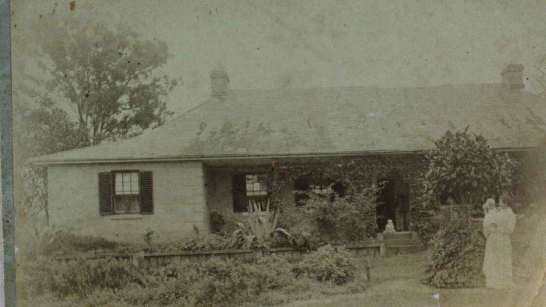 Ravensworth Homestead around 1894. Picture shows one time owner Mrs Hill holding a baby.