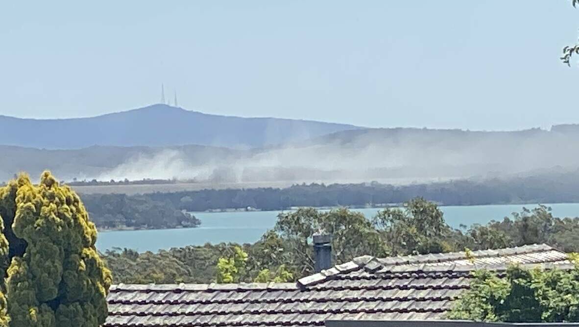 Coal ash blowing across Lake Macquarie in November 2019. Picture: Fred Gleinzer