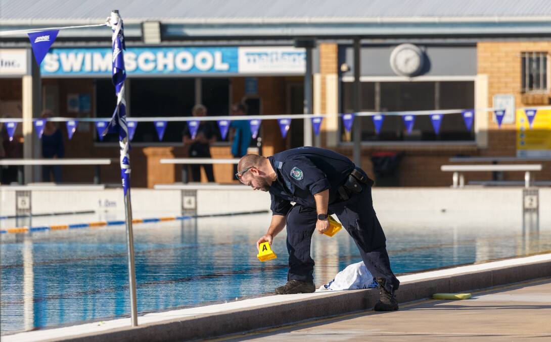 A police forensics officer at Maitland Aquatic Centre on Friday afternoon. 