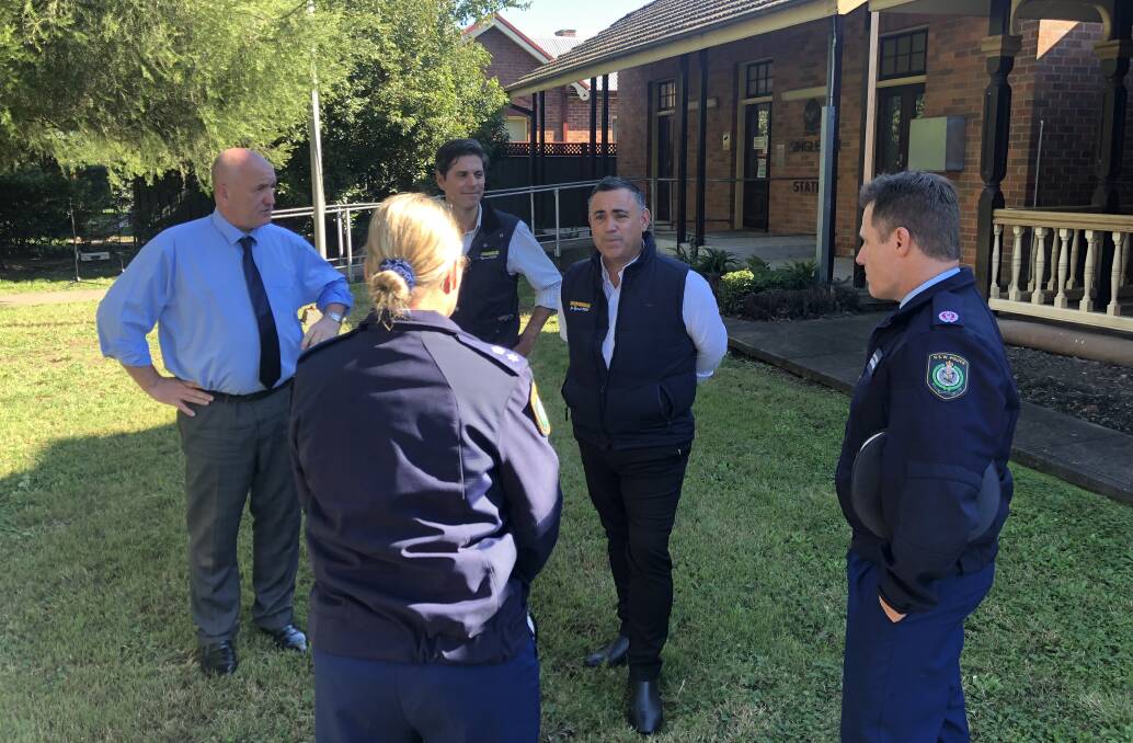 New station: Police Minister David Elliott, candidate David Layzell and John Barilaro meet with police at Singleton Police Station. Picture: Matthew Kelly 