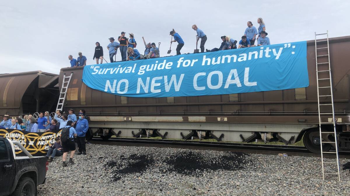 Climate protests block coal trains heading to the Port of Newcastle