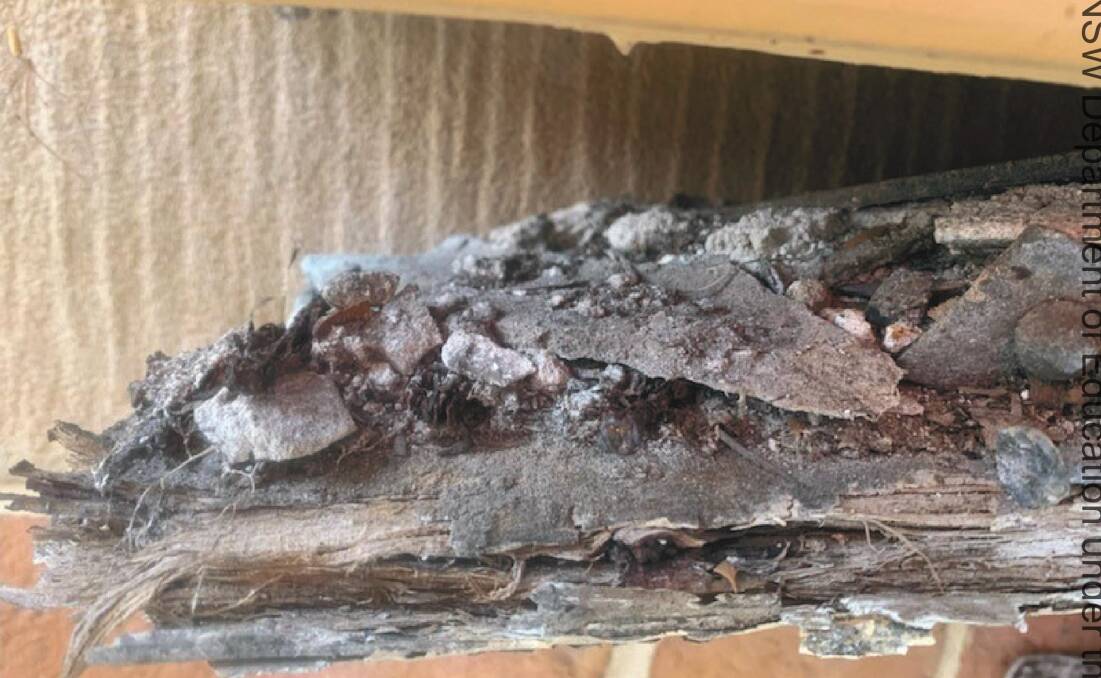 Falling apart: A piece of deteriorating asbestos that was found inside the roof cavity of the heritage building.