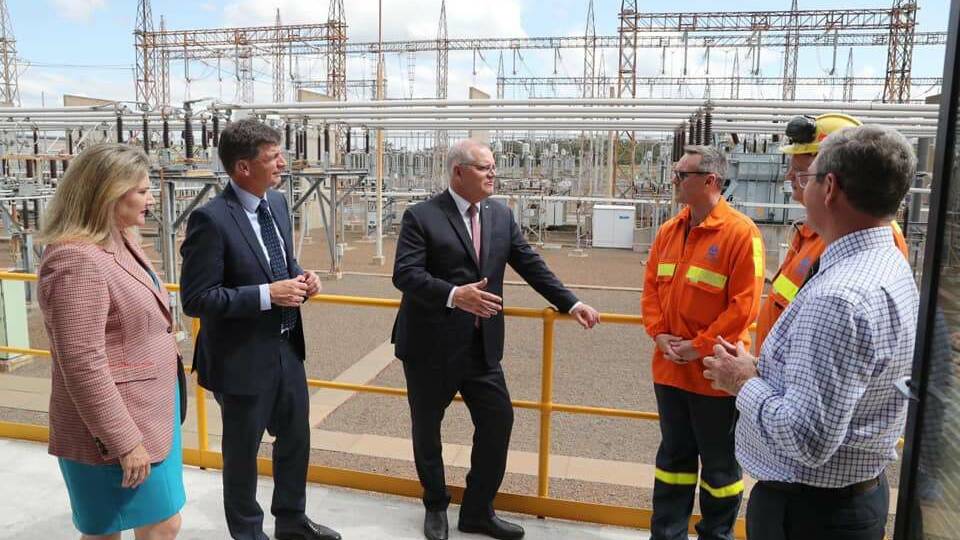 Prime Minister Scott Morrison, Angus Taylor and Senator Hollie Hugues at Tomago Aluminium in September 2020. 
