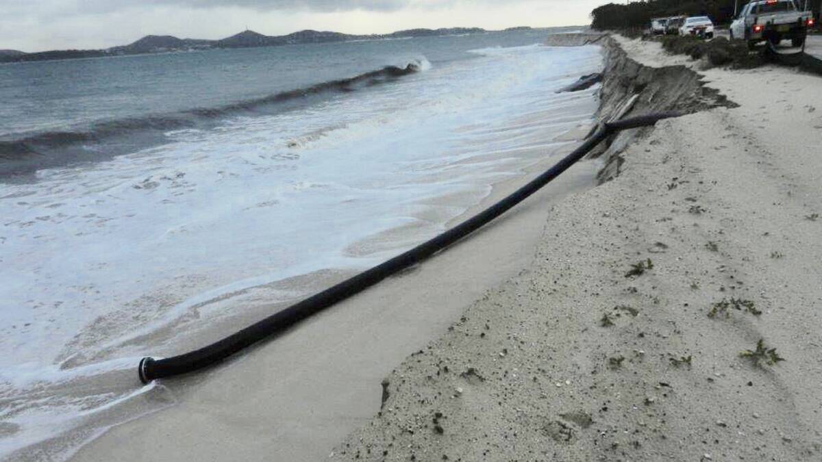 Pipe dream: Part of the recently installed Jimmys Beach sand transfer system that was dislodged on Wednesday morning. Picture: Gordon Grainger. 