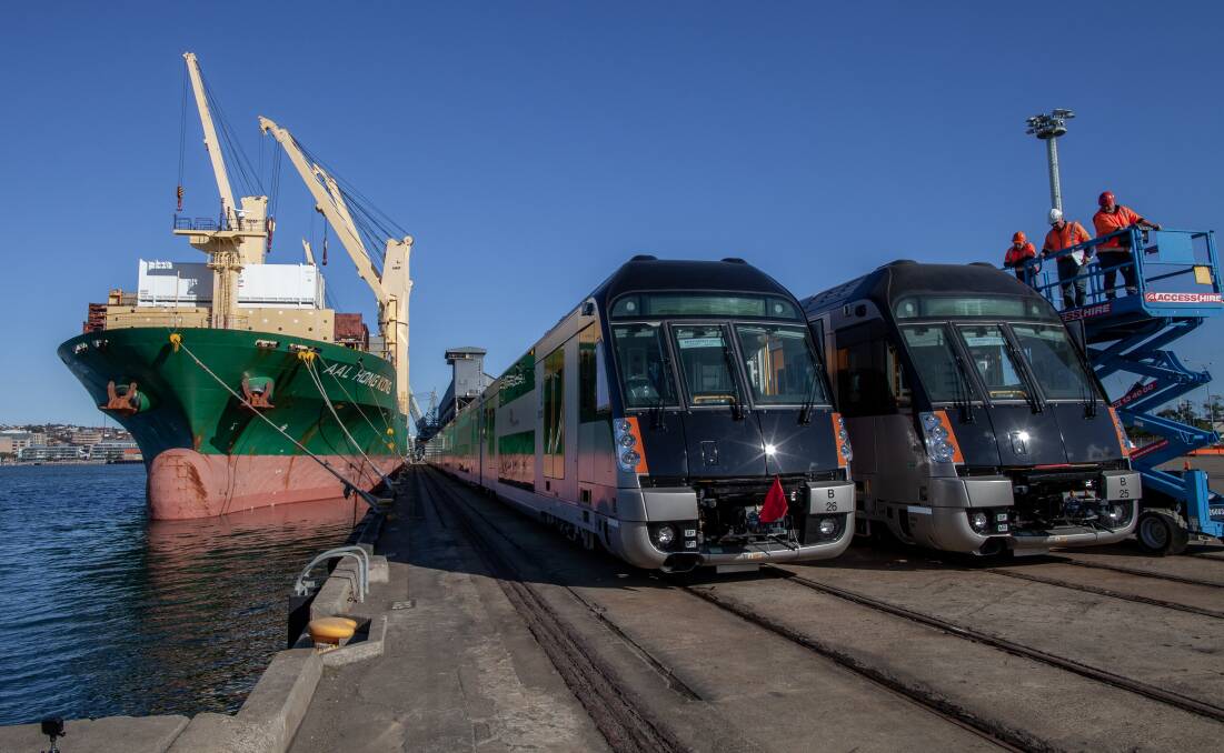 All aboard: The new Sydney trains were placed on the rail at the port and towed to Cardiff. Picture: Port of Newcastle 