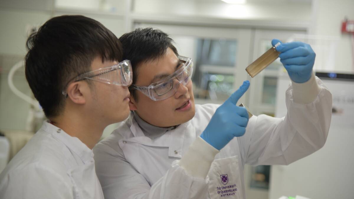 Polymer chemist Dr Cheng Zhang and PhD candidate Xiao Tan 