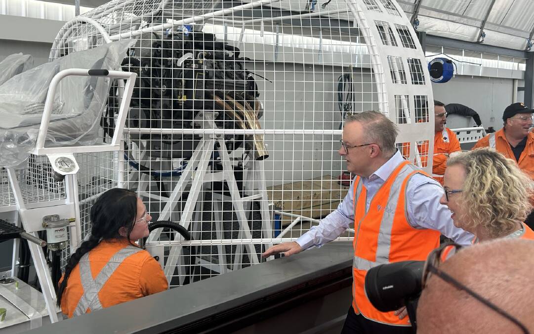 Anthony Albanese speaks with an apprentice at Varley Engineering. Picture by Matthew Kelly