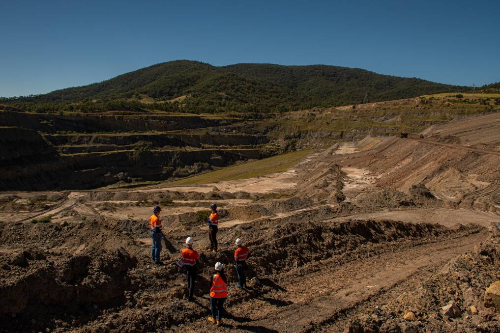 Opportunity: The Bells Mountain project team overlooking the project void this week. Water would be pumped from the void to the top of the mountain. Picture: Simon McCarthy 
