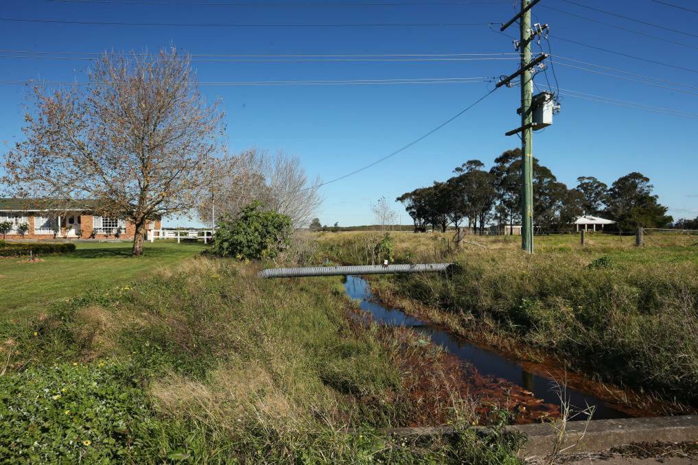 No easy fix: A drain typical of those that run through much of the land earmarked for the Williamtown Special Activation Precinct. The area's complex hydrology has delayed progress on planning work. Picture: Marina Neil