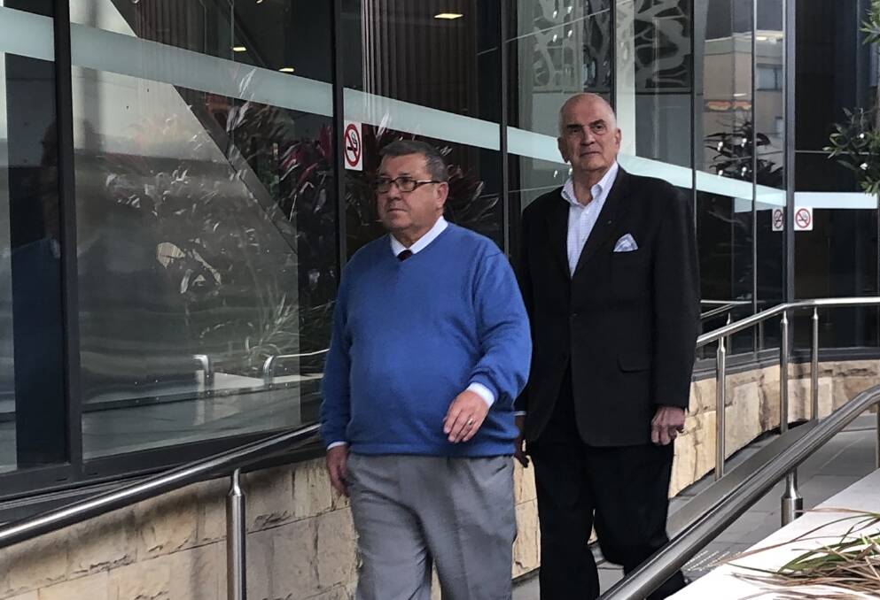 Guilty: Graeme Lawrence and his partner Greg Goyette (front) leave the court after Mr Lawrence was found guilty on charges of sexual intercourse without consent and indecent assault on a person under 16.