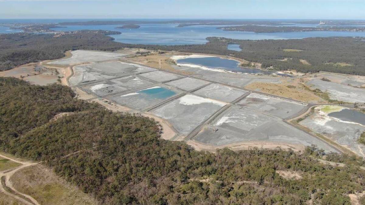 The Eraring ash dam on the shores of Lake Macquaire. The dam's owner, Origin Energy, is liaising with the EPA over the site's ongoing management. 