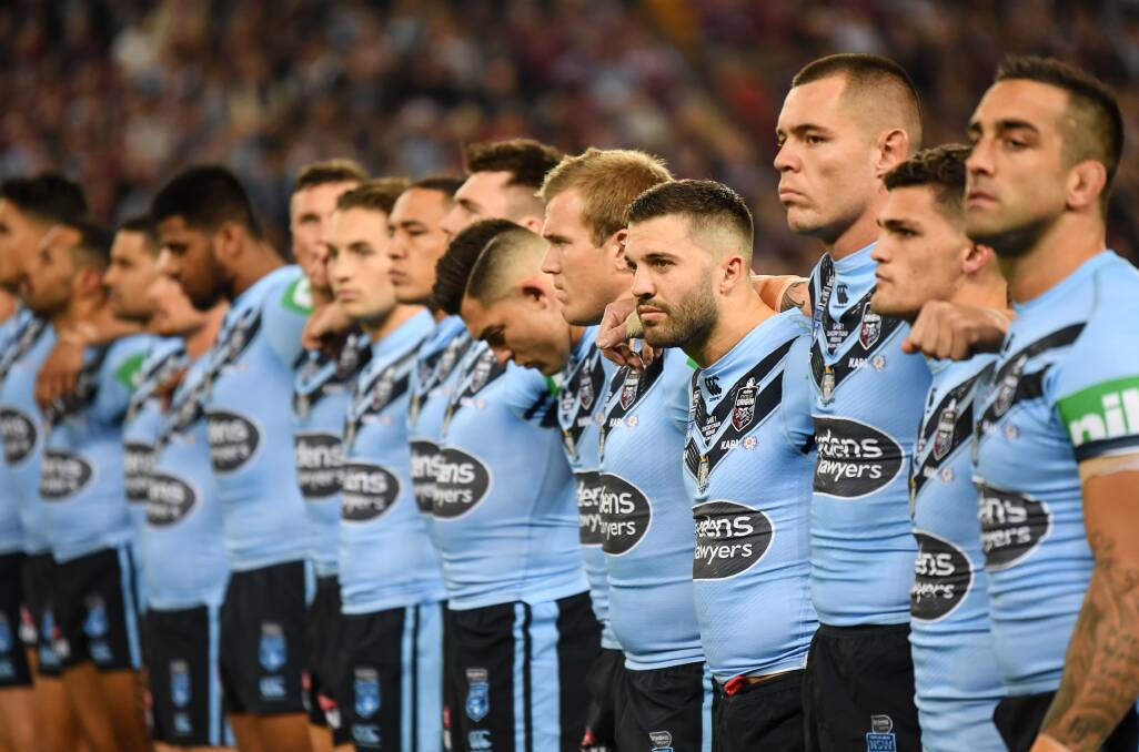 True Blues: NSW players during the national anthem before game one of last year's State of Origin series. Picture: Grant Trouville/NRL Imagery