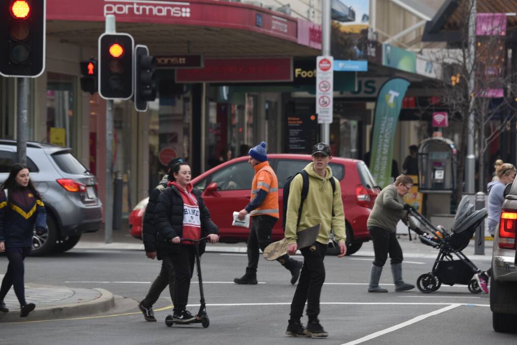 CALL FOR ACTION: Pedestrians crossing the road near the Brisbane Street Mall in Launceston on Thursday. Picture: Paul Scambler