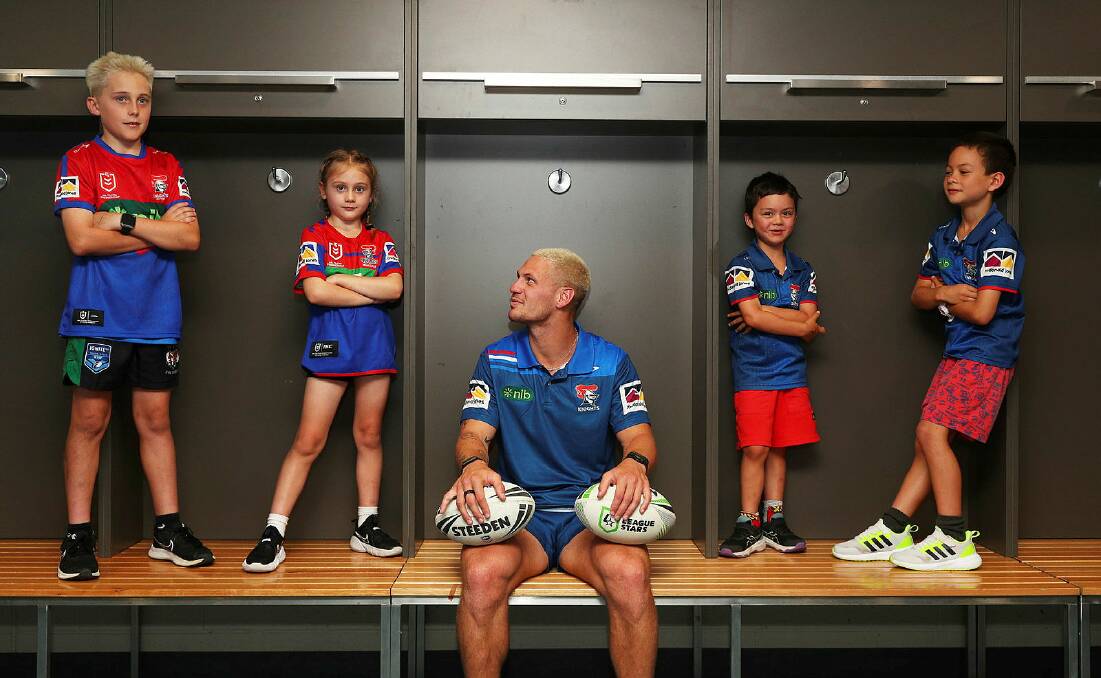Knights skipper Kalyn Ponga in the dressing sheds with Kruz and Livy Henderson and Max and Leo McGlynn. Picture by Peter Lorimer