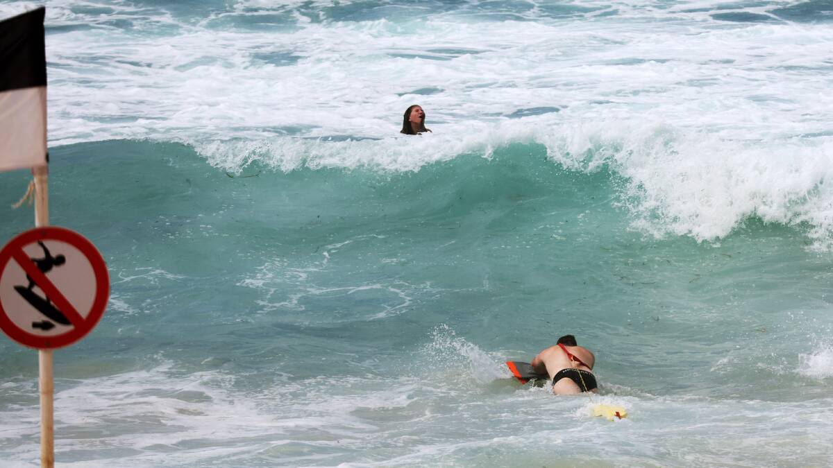 A woman was rescued at Newcastle Beach on Sunday. Picture by Peter Lorimer