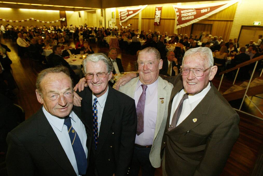 Jack Eames (far right) with Des Healey (left), Frank Elkington and Herb Watkins at Wodonga's Team of the Century function in 2004. Eames was named CHB.
