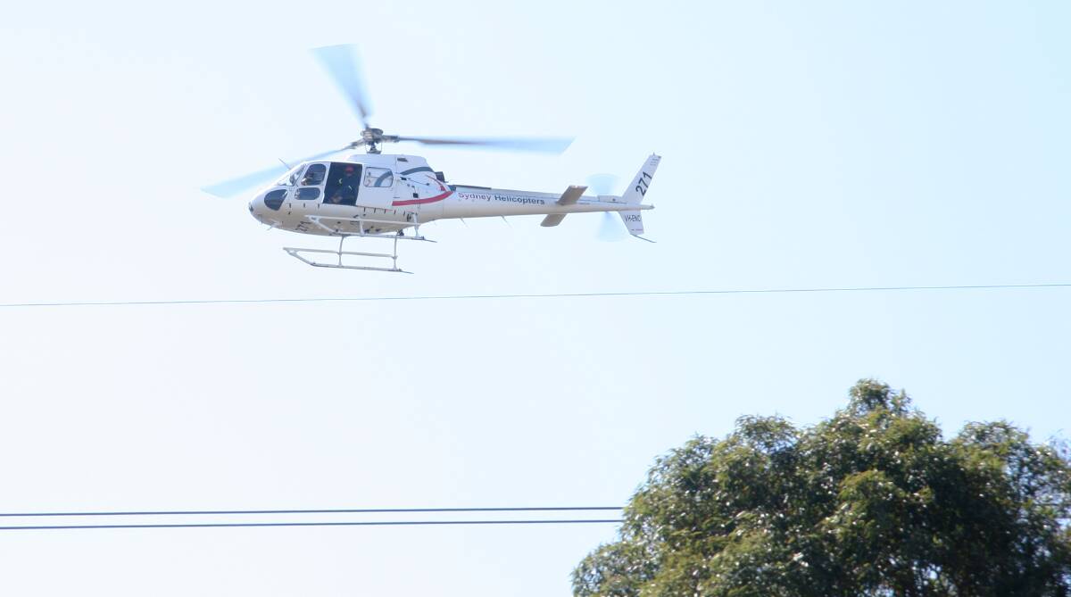 INSPECTIONS: Expect to see the TransGrid chopper in the skies over local high-voltage power lines, including around Eraring, and the Central Coast. Picture: Supplied