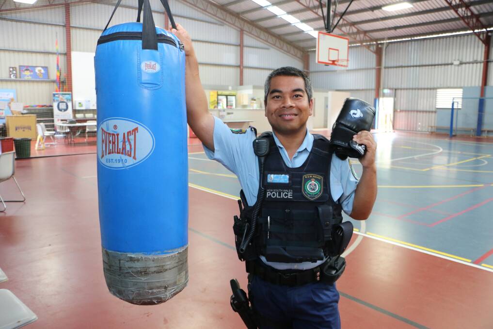 FIT FOR LIFE: Senior Constable Ha Son, pictured, and police chief Superintendent Danny Sullivan will be paired with local youths for Tuesday morning work-out sessions at PCYC Morisset. Picture: David Stewart