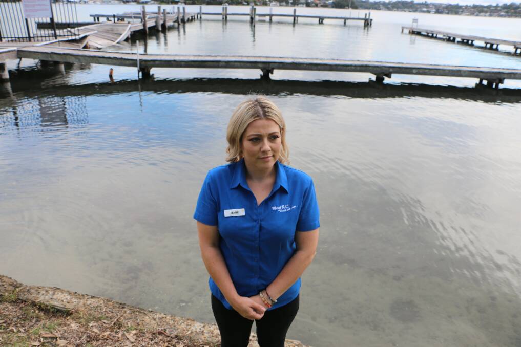 ACCESS DENIED: Wangi RSL Club marketing and promotions manager Denise Dover at the once-busy public jetty behind the club. It's been closed since 2017. Picture: David Stewart